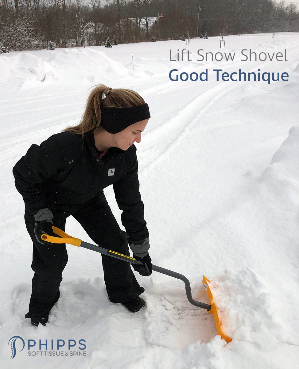 Woman shows good snow shoveling technique with a lift snow shovel | Phipps Soft Tissue & Spine
